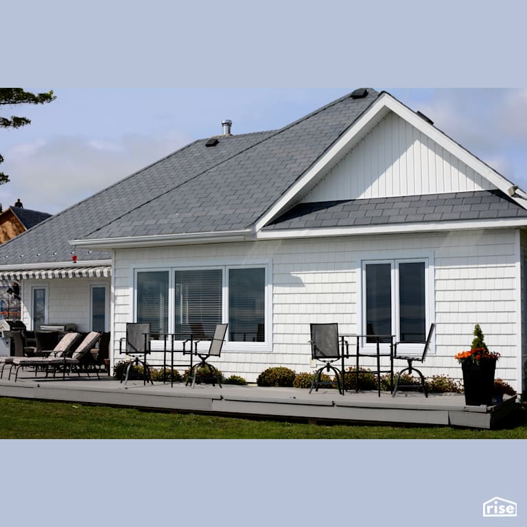 Lakeside Home in Grand Lake, NB, Canada with Recycled Rubber Mulch by Moderne Slate