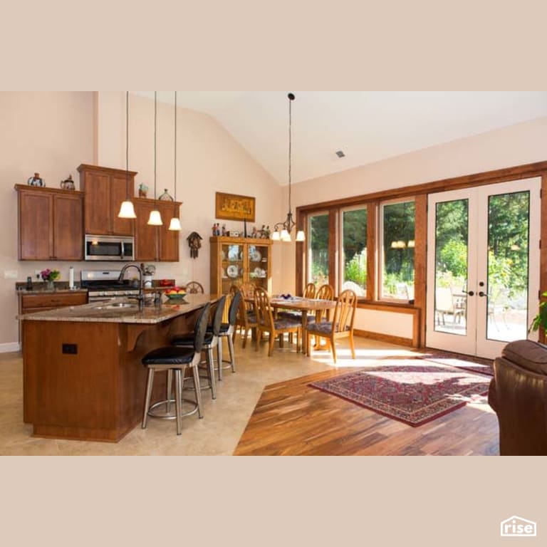Kitchen with Gas Range by Winsome Construction