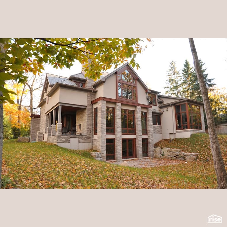 Back exterior with stone siding in the fall with Stone Siding by Masonal Stone Inc