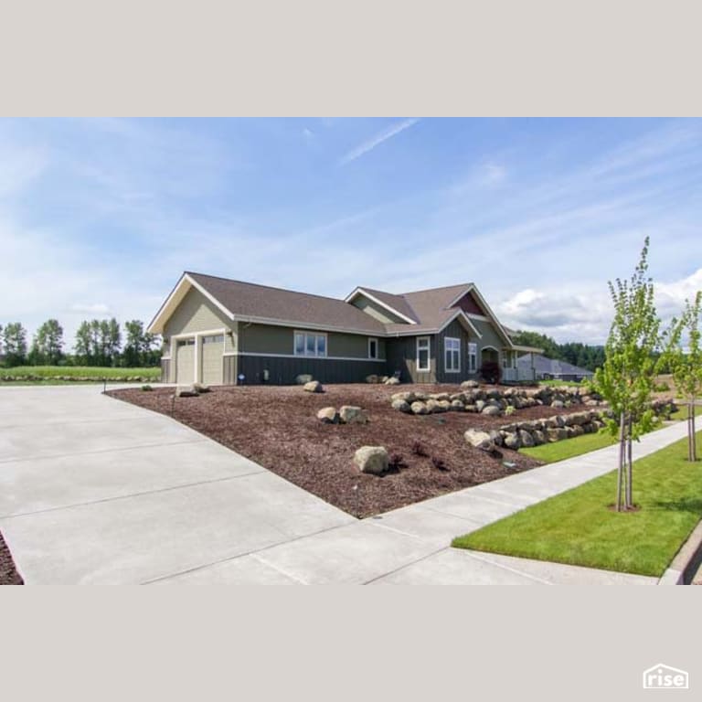 Home Exterior with Clapboard Wood Siding by Winsome Construction