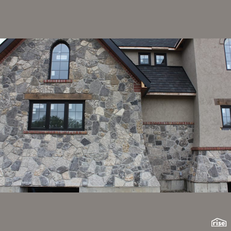 House with Stone Siding with Stone Siding by Masonal Stone Inc