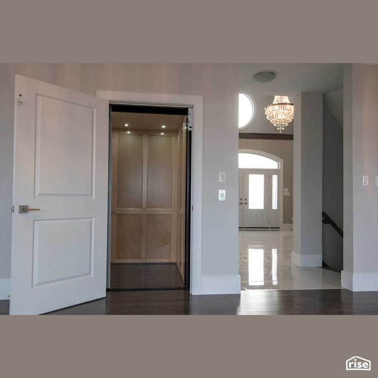 Villa Lina - Entryway and Elevator with Ceramic Tile Floors by Bowers Construction