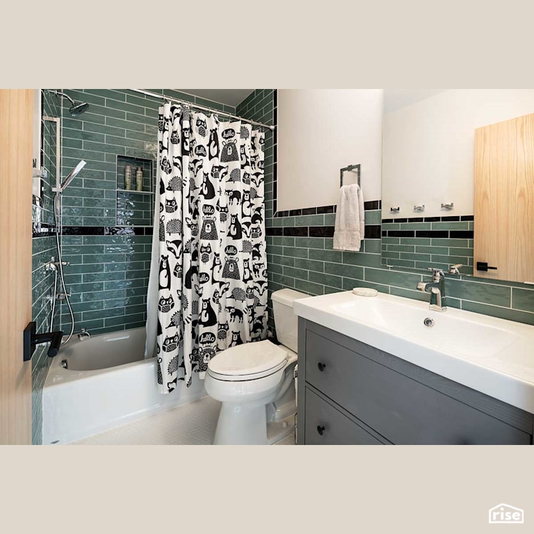 Green bathroom with Low-Flow Bathroom Faucet by Deltec Homes