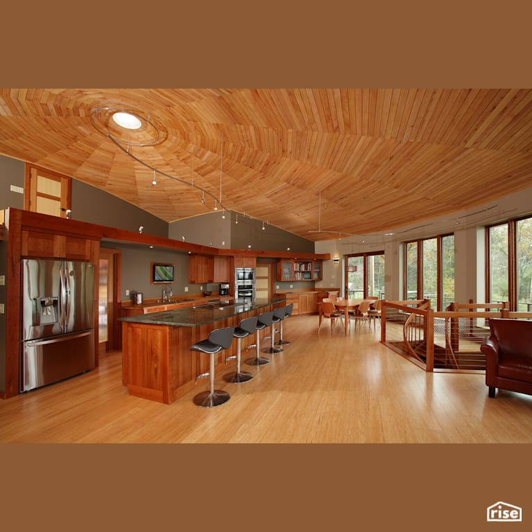 Wide open concept kitchen with Laminate Flooring by Deltec Homes