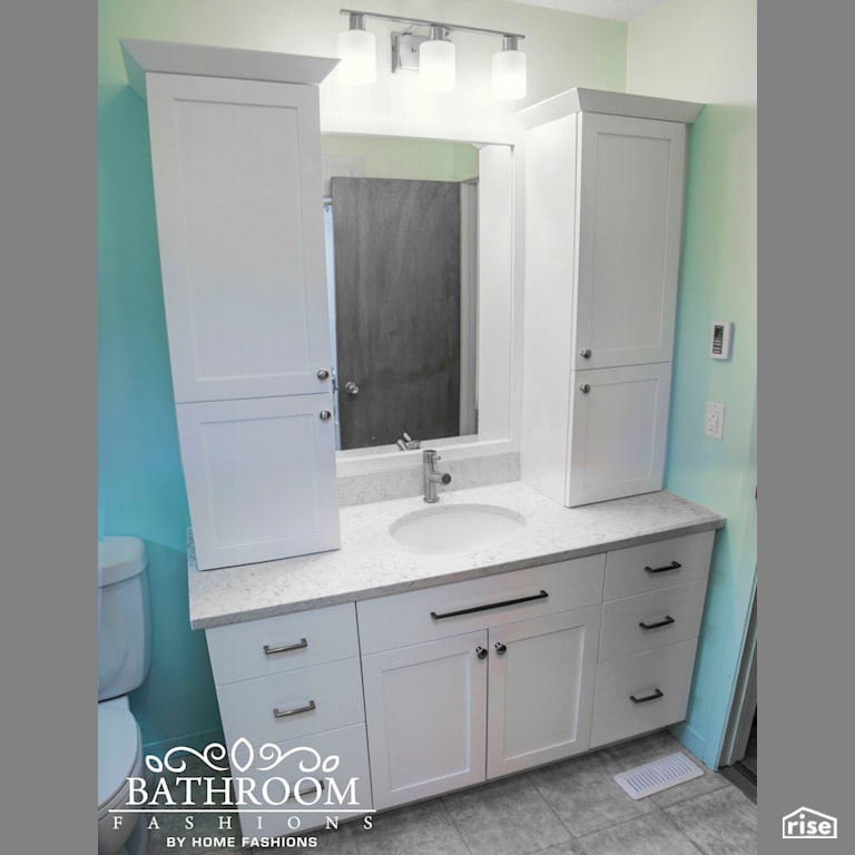 Bathroom Fashions - White and Teal Bathroom with Low-Flow Bathroom Faucet by Home Fashions