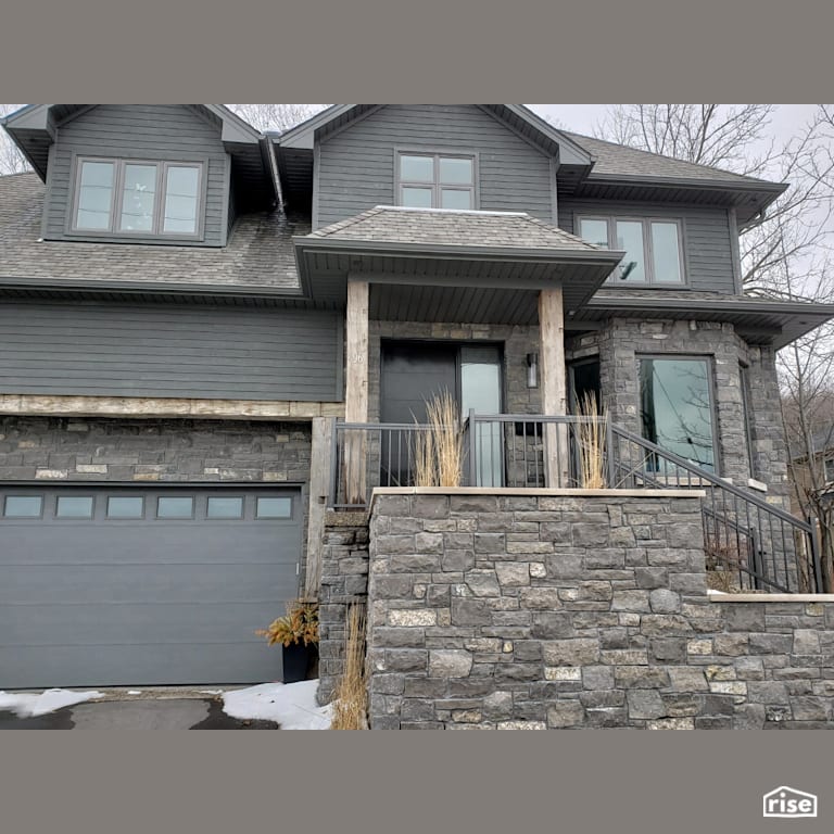 Stone sided entryway with staircase with Stone Siding by Masonal Stone Inc