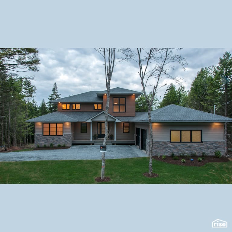 Modern Retreat - Exterior with Brick Siding by Homes by Highgate