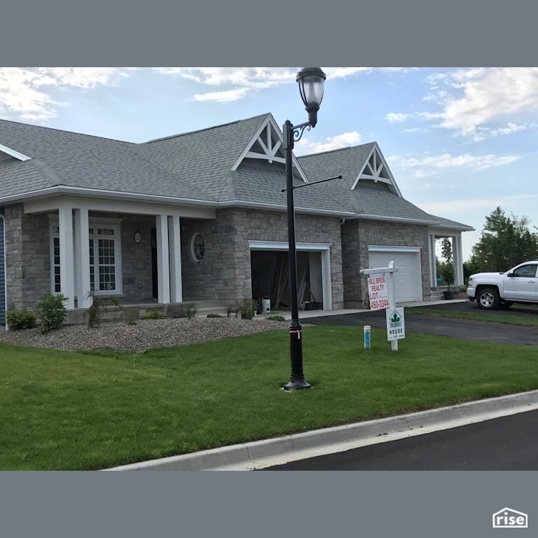 Bobak Place  - Exterior with Fixed Window by Hill Bros.