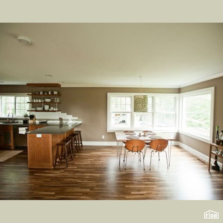 Kitchen and Dining Room with FSC Certified Wood Cabinet by Constructive Builders