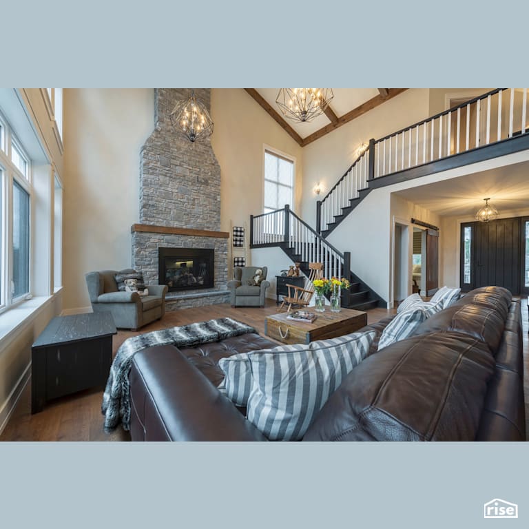 A River Runs Through - Living Room with Gas Fireplace by Homes by Highgate