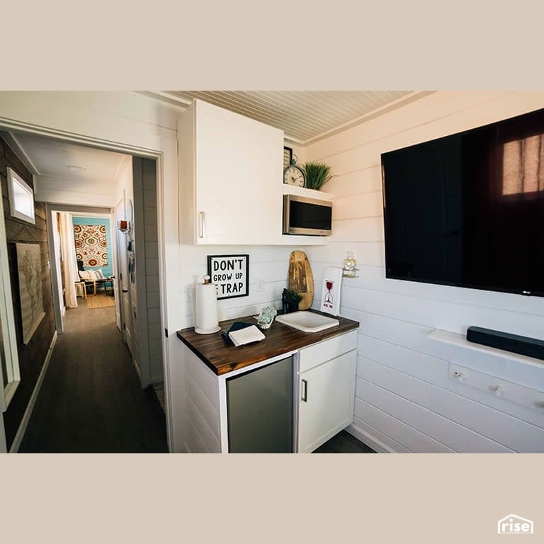 Kitchen Leading to Hallway with Low-Flow Kitchen Faucet by Alternative Living Spaces