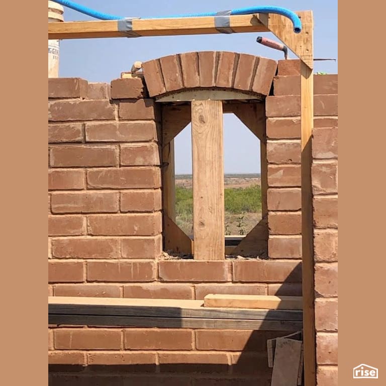 Compressed earth block home window frame with Compressed Earth Blocks by TexaTerra Block