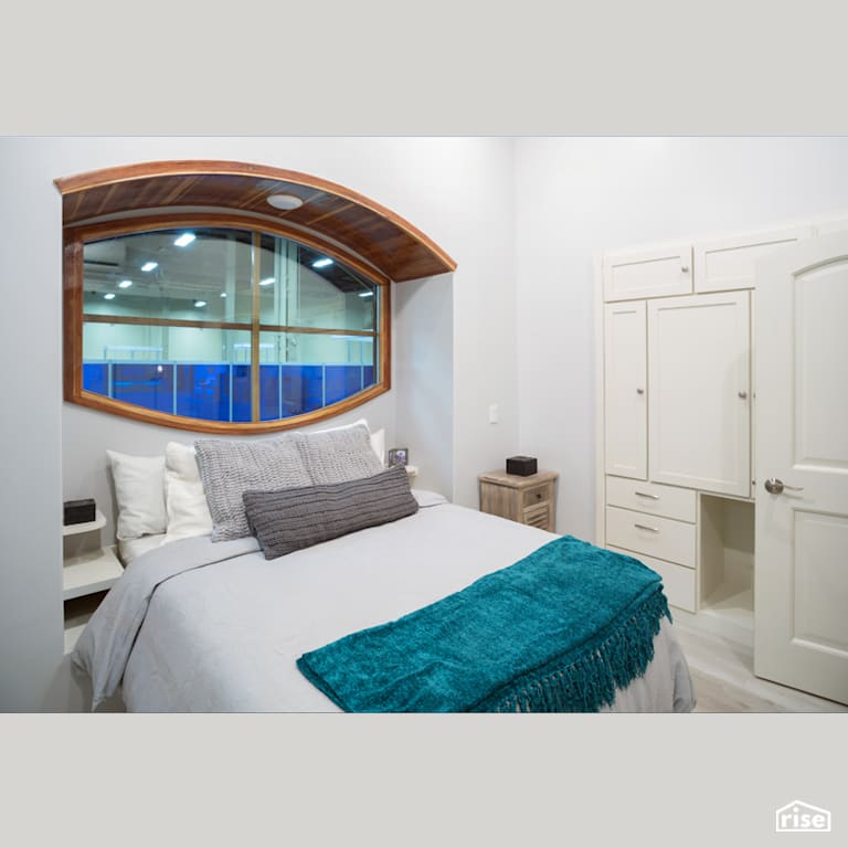 Prefab Master Bedroom with Wood Window Frame by Shelter Dynamics, Inc.