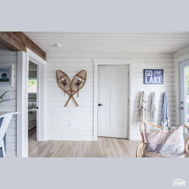 Cottage Hall with Laminate Flooring by Reimagine Designs