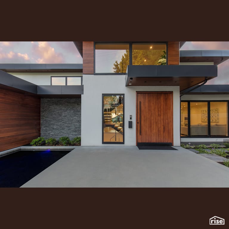 Entryway with Stone Step with Outdoor Gardens by Synthesis Design