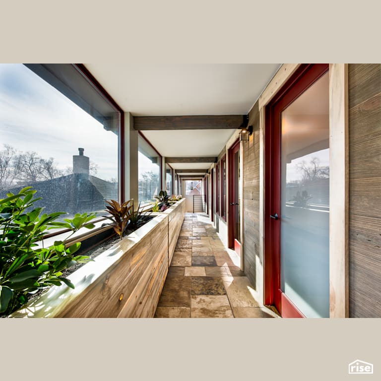Window-lined hallway with Wall Mounted Outdoor Lighting by Alpen High Performance Products