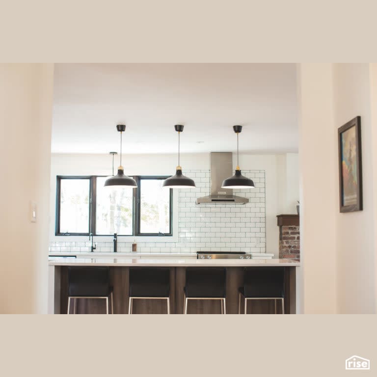 Joyfully Warm Rothesay Reno Kitchen with Gas Range by Vantage Build