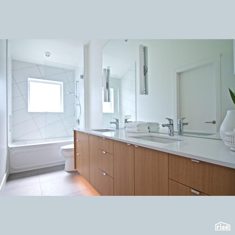 Kids Bathroom with Low-Flow Showerhead by Naikoon Contracting