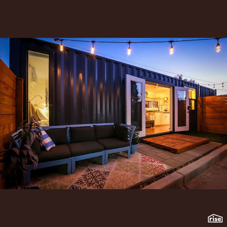 Container Home Patio At Night with Low-Flow Kitchen Faucet by Alternative Living Spaces