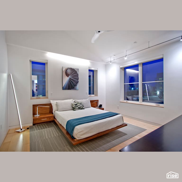 Bright bedroom with hardwood floor and platform bed with FSC Certified Hardwood by Alpen High Performance Products