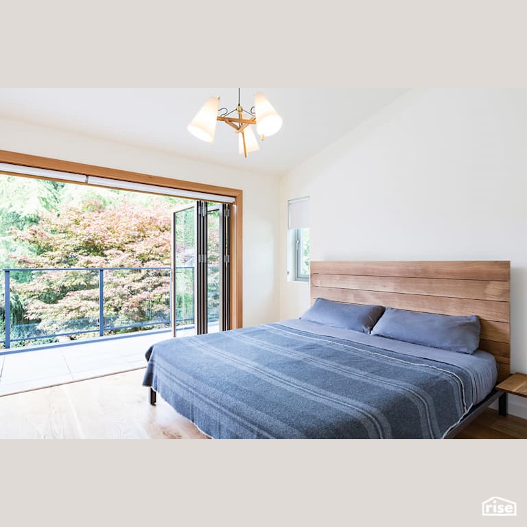 Bedroom with Tilt-and-Turn Patio Door by Naikoon Contracting
