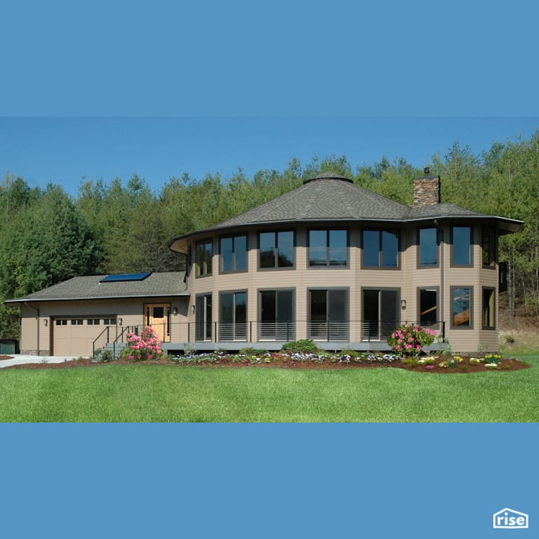 Roundhouse model with connected garage with Fixed Window by Deltec Homes