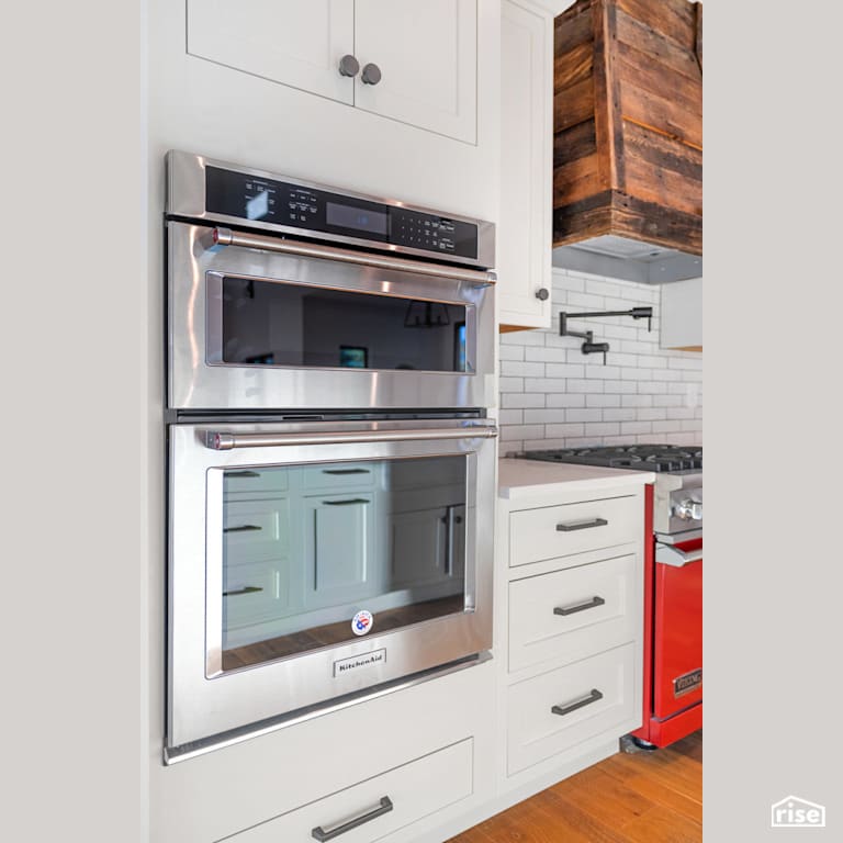 Double wall ovens with reclaimed wood with Wall Oven by Revolve Design Build