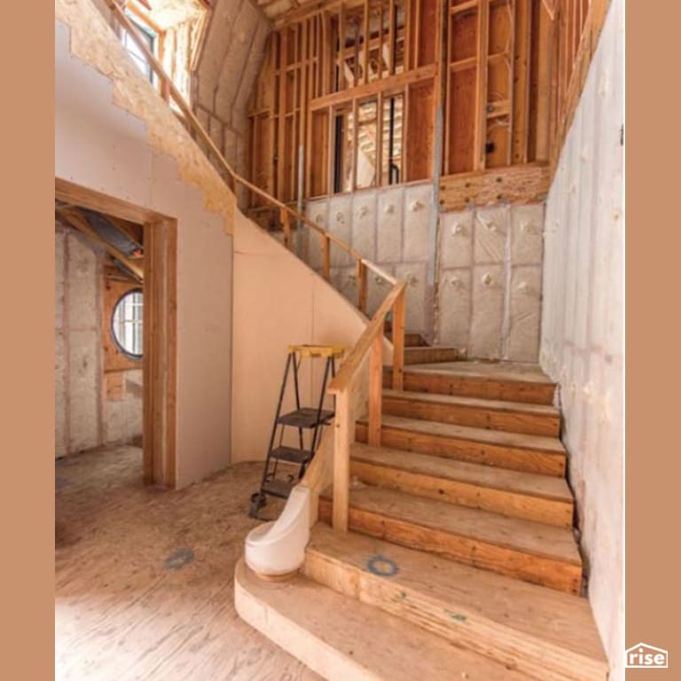 Installing Sheeps Wool Batt Insulation in a Interior Staircase with Sheep's Wool Batt Insulation by Havelock Wool