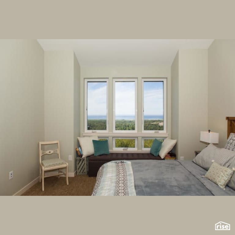Bedroom with Carpeting by Winsome Construction