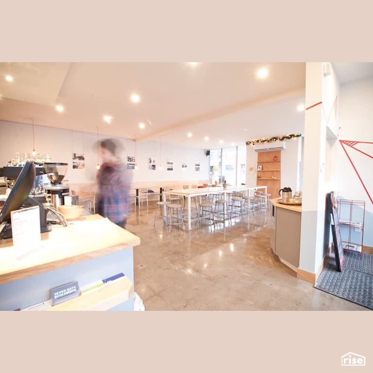 View of the cafe with Wood Veneer Cabinet by RSI Projects