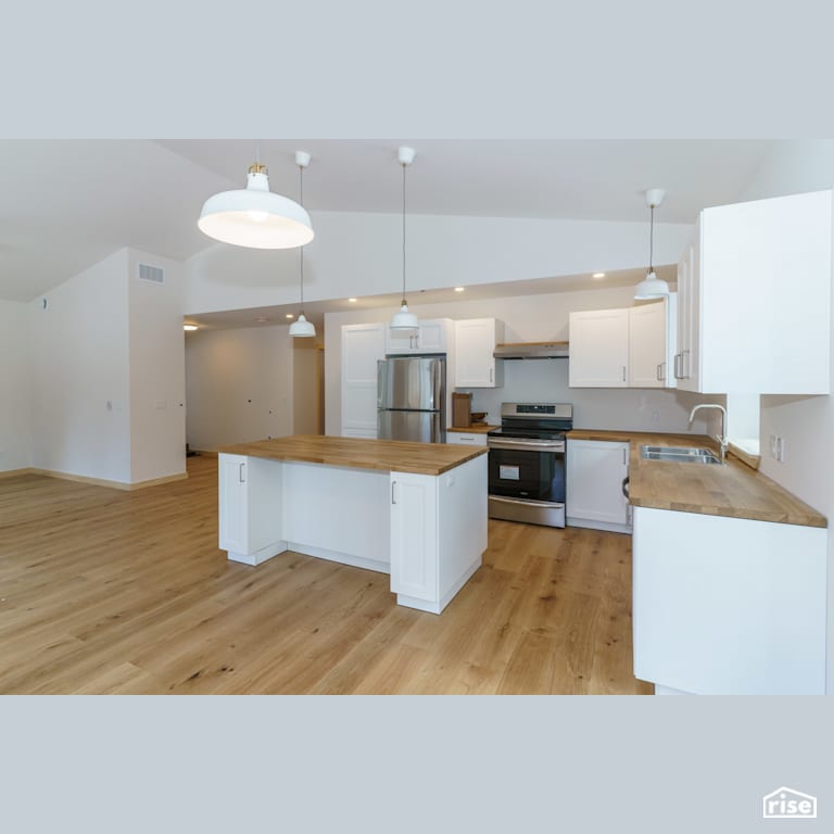 Interior_Unit1 Kitchen leading to Hallway with Dishwasher by Tooketree Passive Homes