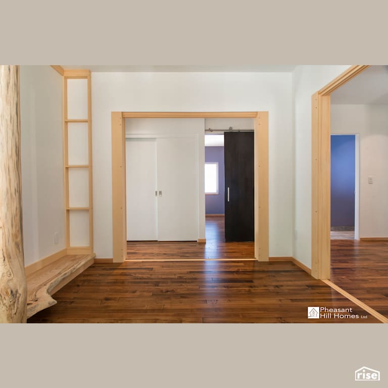 Tatami Room with Engineered Hardwood by Pheasant Hill Homes Ltd.