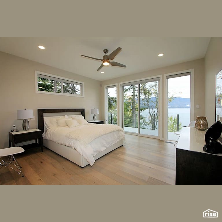 Copper Island Fine Homes - Interior with Laminate Flooring by Copper Island Fine Homes Inc.