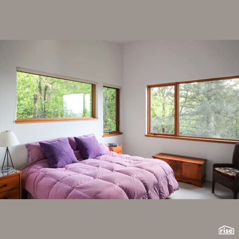 Bedroom with Fixed Window by Winsome Construction