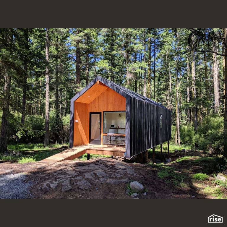 Guest Cabin Exterior with Accent Outdoor Lighting by RAD LAB