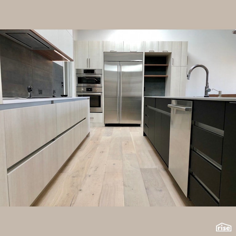 Light on dark open concept kitchen with Low-Flow Kitchen Faucet by Revolve Design Build