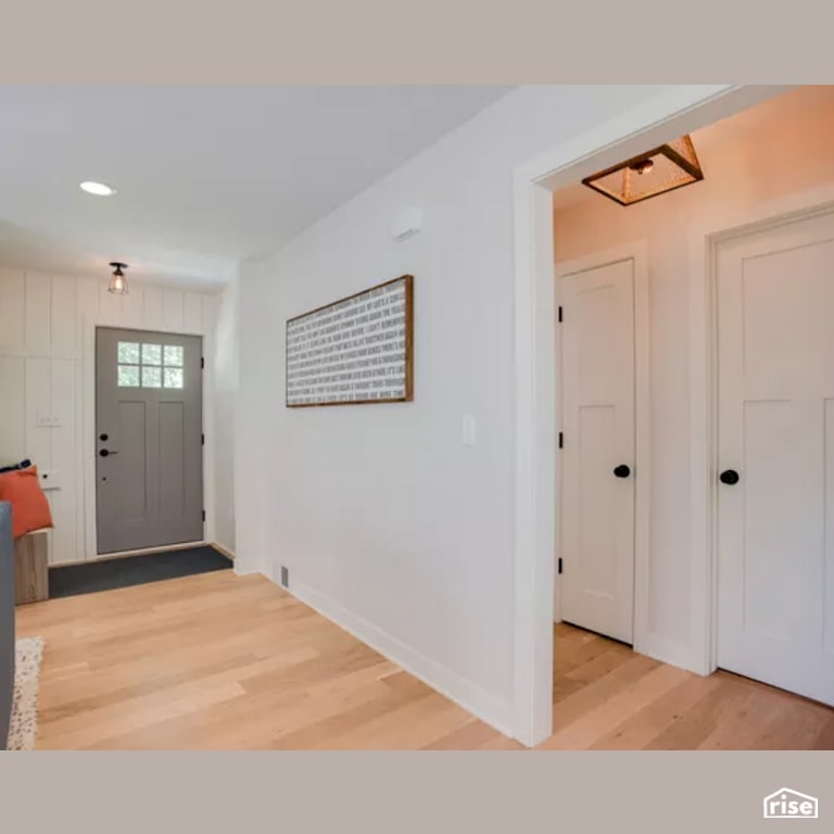 Entryway with Laminate Flooring by Constructive Builders