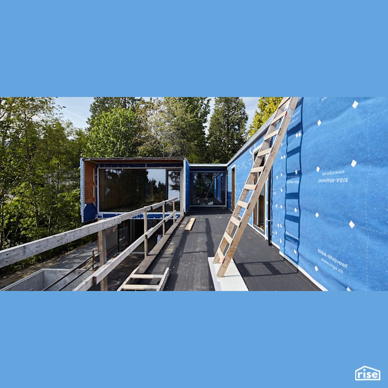 Vapor control layer on exterior by deck with Exterior Air Sealing Tape by SIGA North America