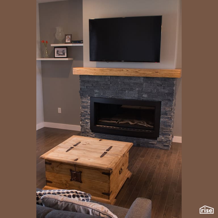 The Atlanta - Living Room with Gas Fireplace by Justin Bowers Homes