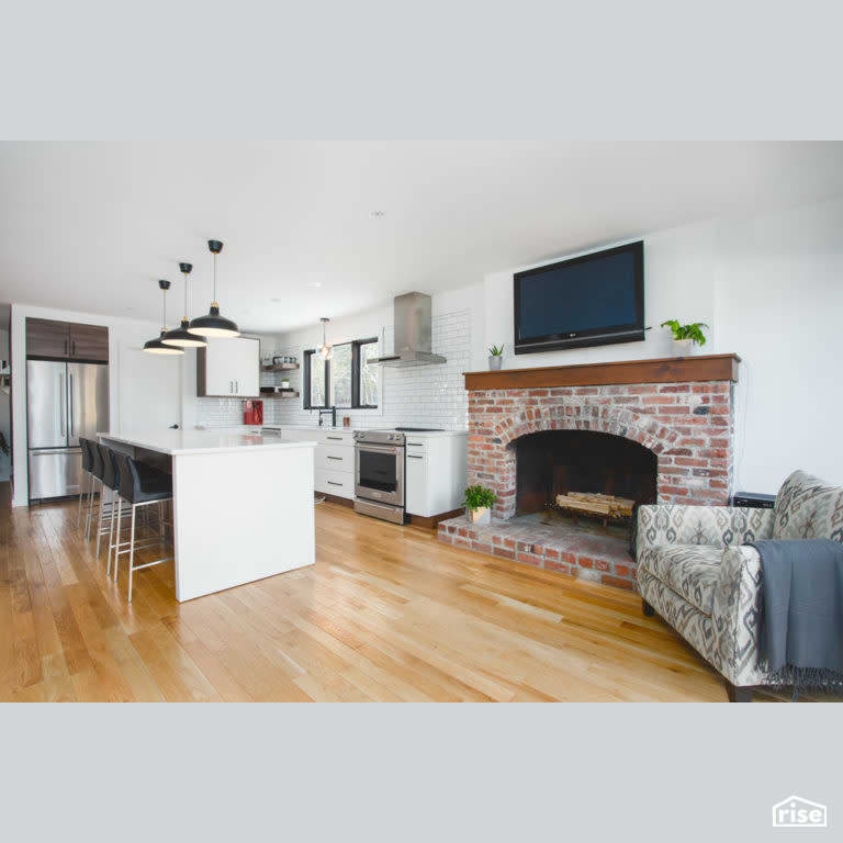 Joyfully Warm Rothesay Reno Kitchen with Gas Range by Vantage Build