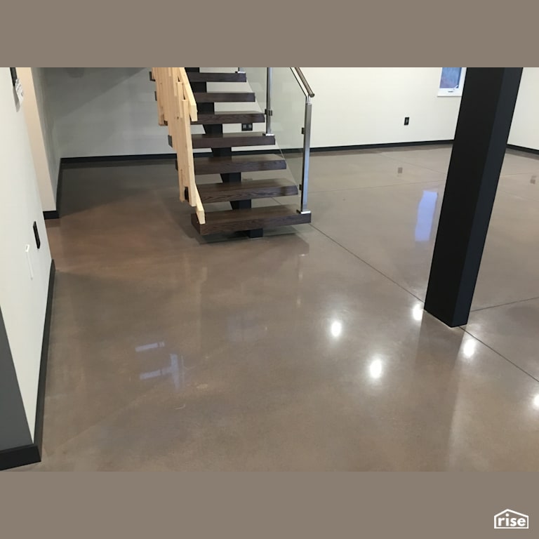 800 Grit cream polish with grey dye with Concrete Flooring by DeltaCrete