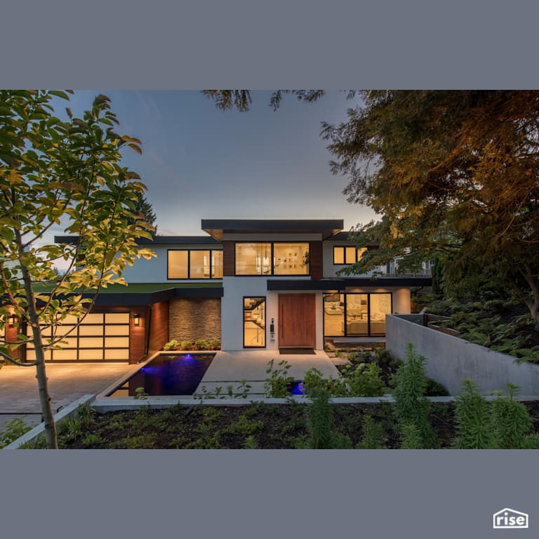 Exterior Garden and Entryway at Dusk with Shiplap Wood Siding by Synthesis Design