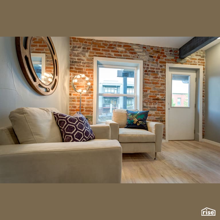 Bungalow entryway with exposed brick and beam with FSC Certified Hardwood by Alpen High Performance Products
