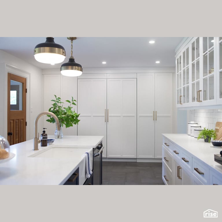 Glass kitchen cabinet doors with Ceramic Tile Floors by J Russon Construction