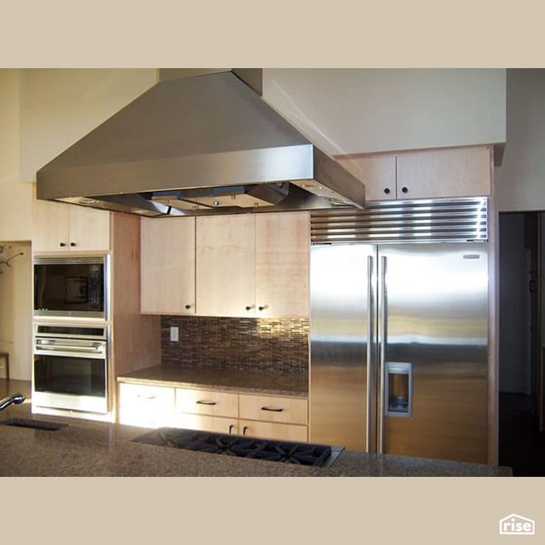 Kitchen with Gas Range by Winsome Construction