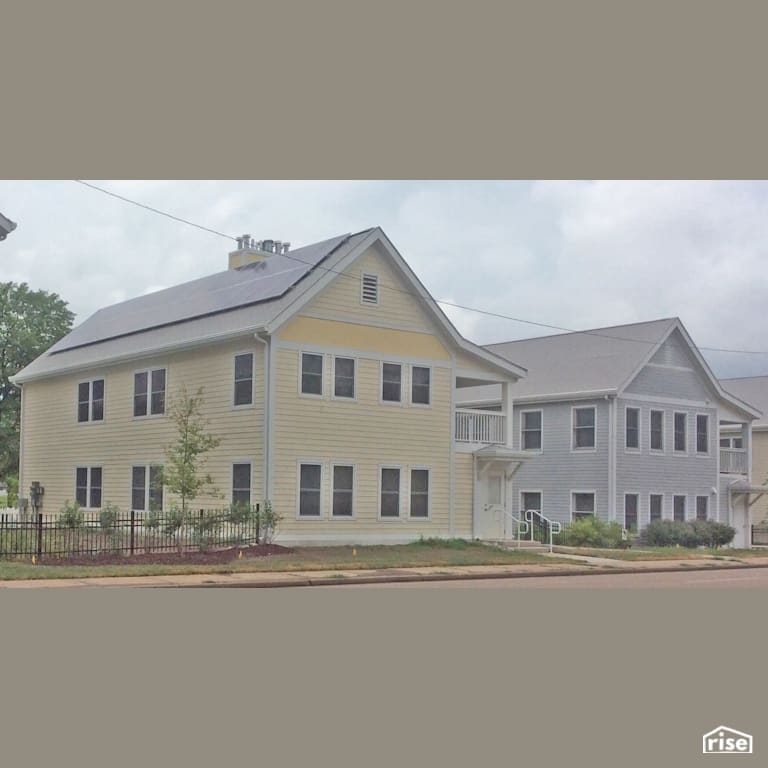 Two-story townhomes with energy efficient windows and solar panels with Triple Pane Window by Alpen High Performance Products