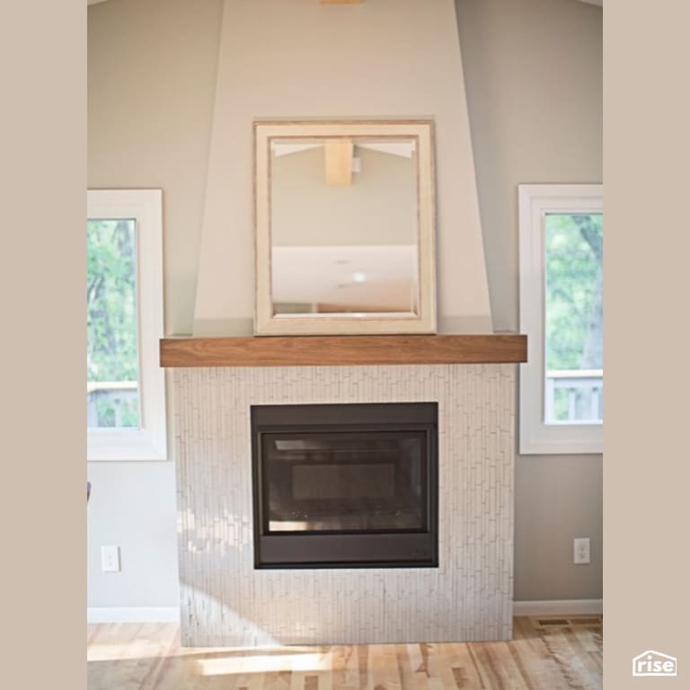 Living Room with Gas Fireplace by Constructive Builders
