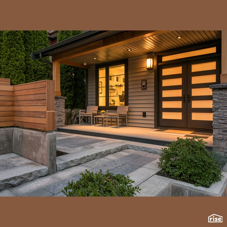 Front Entrance with Accent Outdoor Lighting by My House Design/Build Team Ltd.