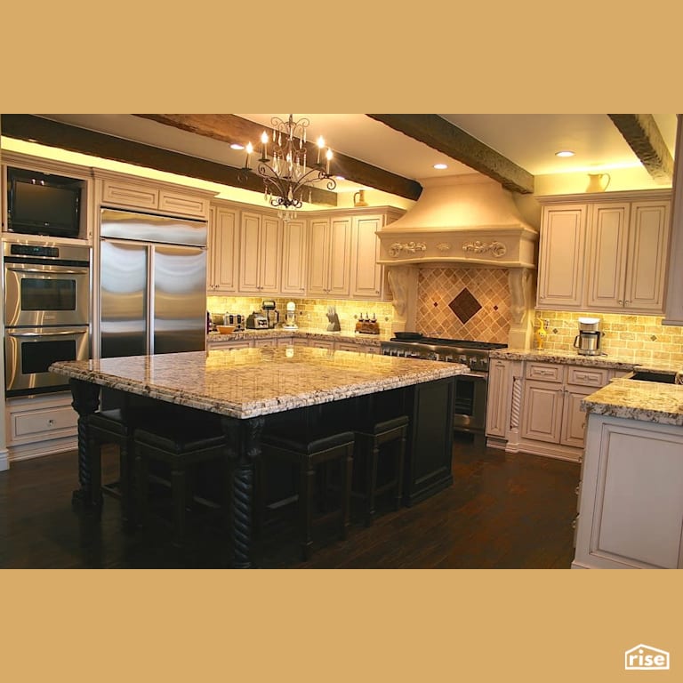 Large kitchen with exposed wood beams with Wall Oven by Revolve Design Build
