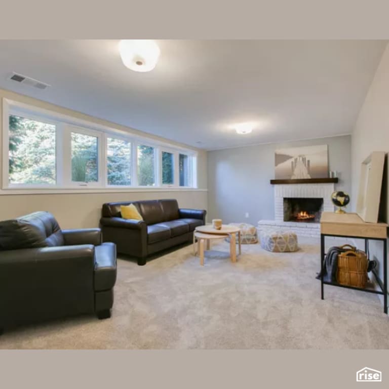 Family Room with Ceiling Light by Constructive Builders